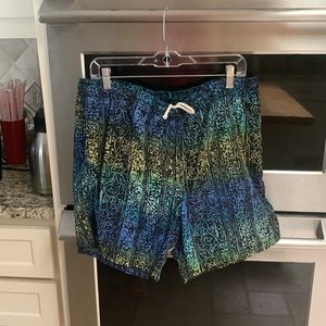 Gitano size large swimsuit with side pockets.
